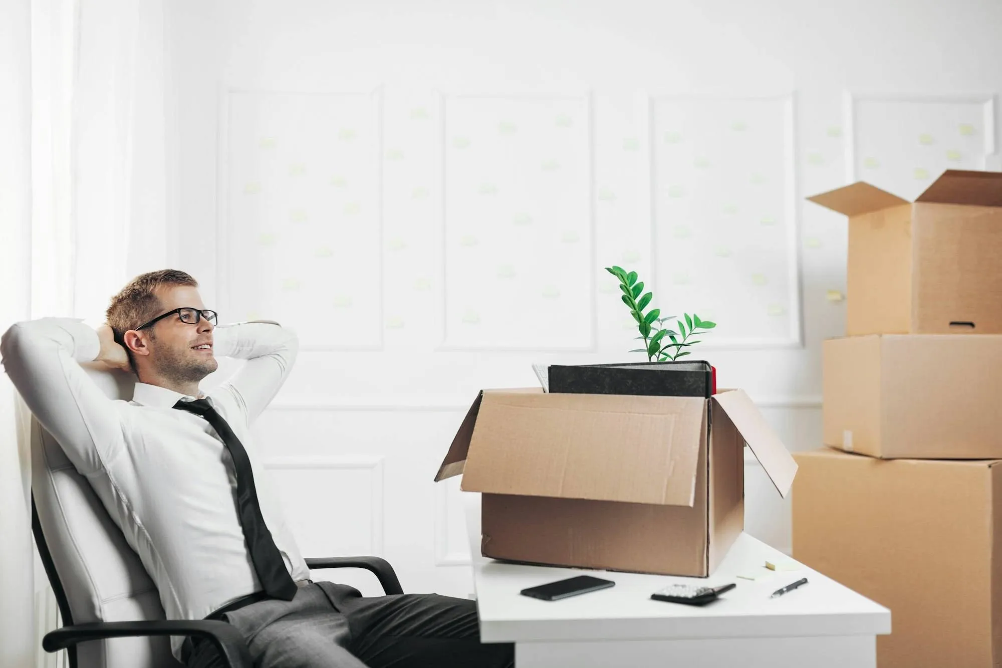 Businessman moving into a new office